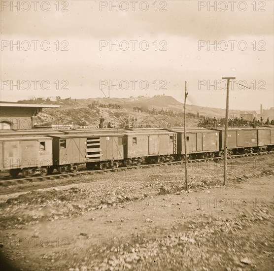 Chattanooga, Tenn. Boxcars and depot with Federal cavalry guard beyond 1864