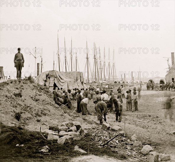 City Point, Virginia. Blackes working along the wharf 1863