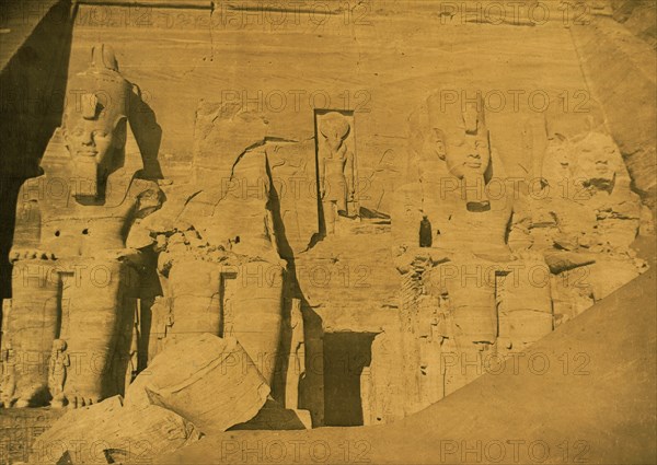 Colossal sculptures of Ramses II at entrance to the Great Temple at Abu Simbul, Egypt 1880