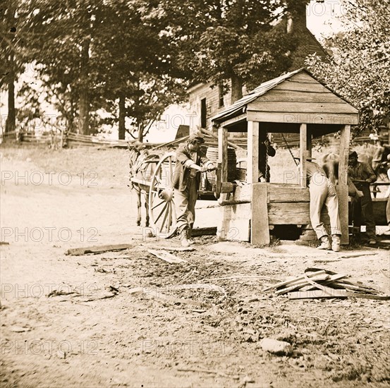 Fredericksburg, Virginia. Soldiers drawing water from a well. Army of the Potomac 1864