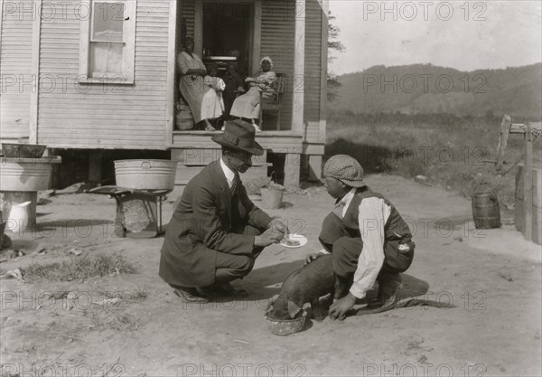 George Cox, 13 year old colored boy, has just joined the 4 H Club and is raising a pig.  1921