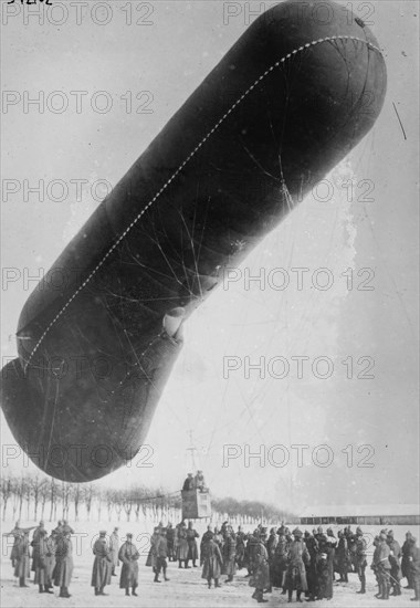 German Observation balloon in snow, w/ soldiers