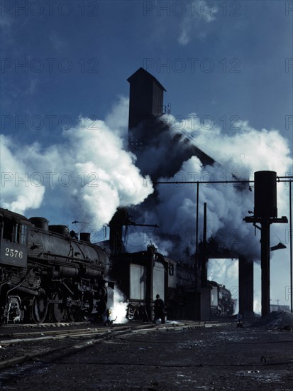 Locomotives getting their energy from coal and dropping their ashes 1942