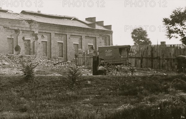 Petersburg, Virginia. View of gas works. (Photographic wagon, Engineer Department shown) 1865