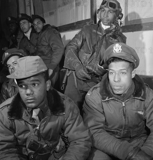 Photograph of Tuskegee airmen attending a briefing in Ramitelli, Italy, March 1945 1945