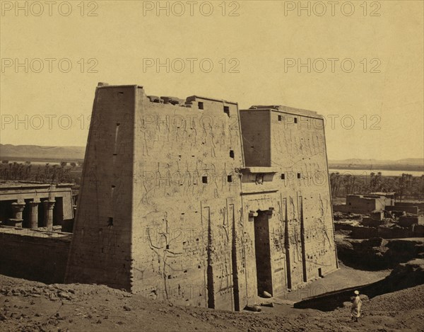 Pylons adorned with bas-relief of the Temple of Horus at Idfu, Egypt. 1865