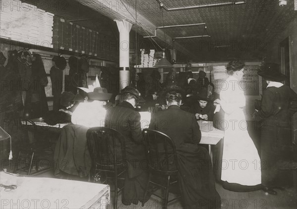 Call Desk for Woman taking work home at the Martini Bedding and Slipper Factory in Lower Manhattan 1912