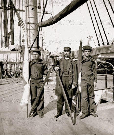 Signalmen of Rear Admiral John A. Dahlgren's flagship receiving a message from the Georgia shore 1864