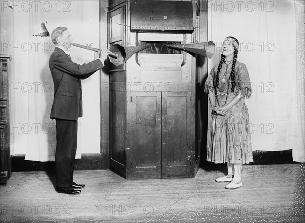 Singer & Flautist Put their sounds through megaphones into a Recording Box