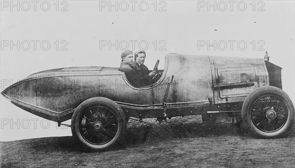 Space Age Car with fins in design far ahead of its time with seated race car driver and known as a "Richard Special"