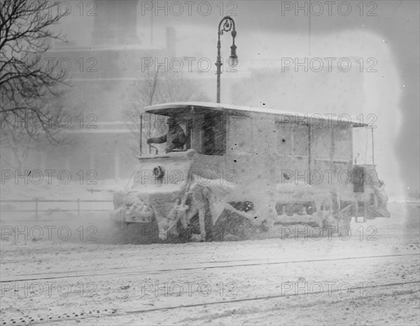 Trolley Snowplow Pushes ahead in heavy snowfall on New York Streets 1910