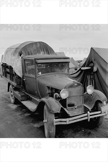 Truck Parked by Tent in FSA site 1939