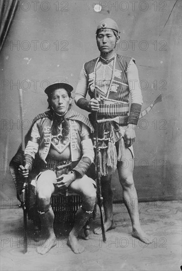 Two Formosan Tribal Chiefs in Native Garb pose