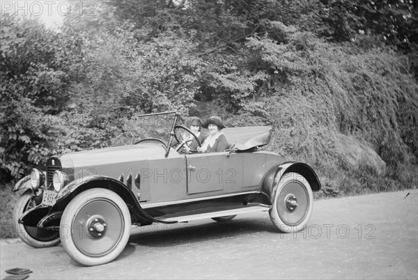 Two women in a Coupe - marked Young