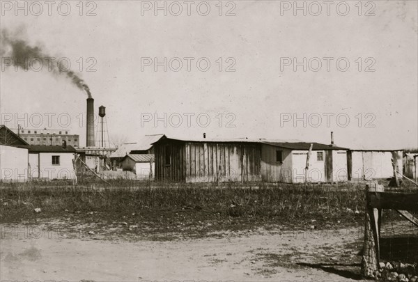 Views of "The Jungle," in Ft. Collins, the section in which the beet workers live when not away working the beets. In Greeley, this segregated section is called "The Pansy Bed" (from the varied and vivid coloring of homes). In Sterling, it is called "Petersburg."  1915