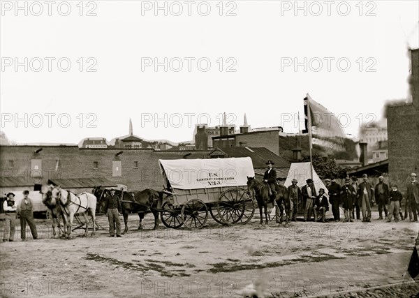 Washington, D.C. Field relief wagons and workers of U.S. Sanitary Commission 1865