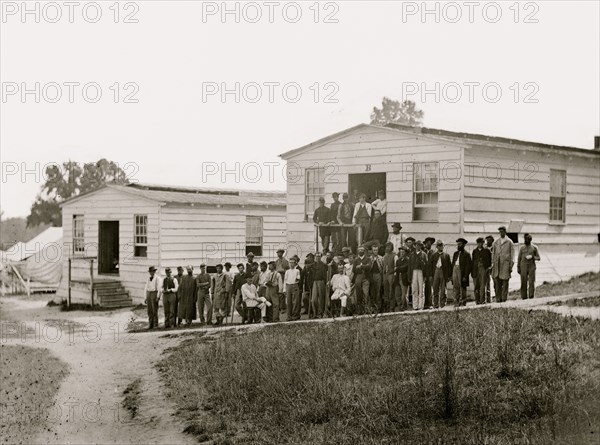 Washington, District of Columbia (vicinity). Group of patients in front of ward B. Harewood hospital 1863