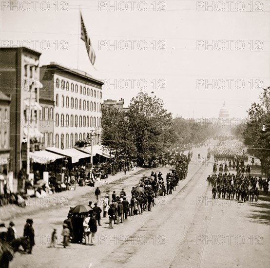 Washington, District of Columbia. The Grand Review of the Army. Infantry passing on Pennsylvania Avenue near the Treasury 1865