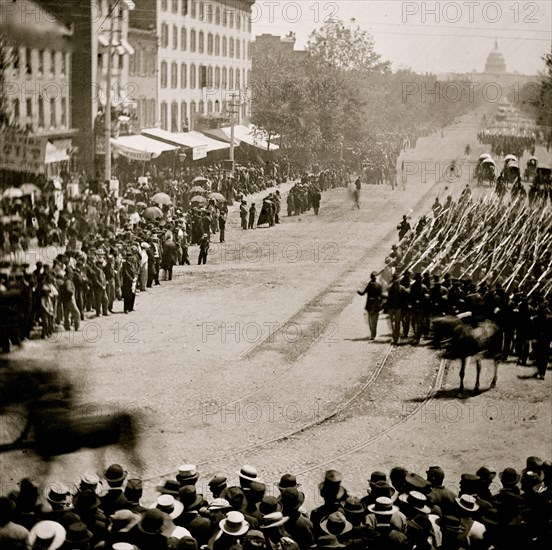 Washington, District of Columbia. The Grand Review of the Army. Units of 20th Army Corps, Army of Georgia, passing on Pennsylvania Avenue near the Treasury 1865