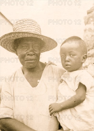 Woman with infant, Old Bight, Cat Island, Bahamas, 1935