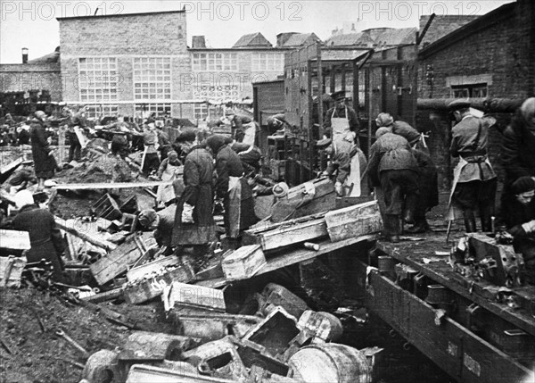 Evacuated factory machinery arriving at the kirov plant in the urals from the western front, before the war, the plant built railway cars, now, it will be producing tanks, 1941 or 1942.