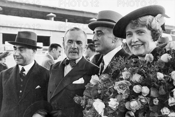 Former american ambassador, joseph e, davies with his wife at the byeloruskiy railway terminal in moscow as they were leaving for america, june 1938, on the left is the iranian ambassador and next to him is the french ambassador.