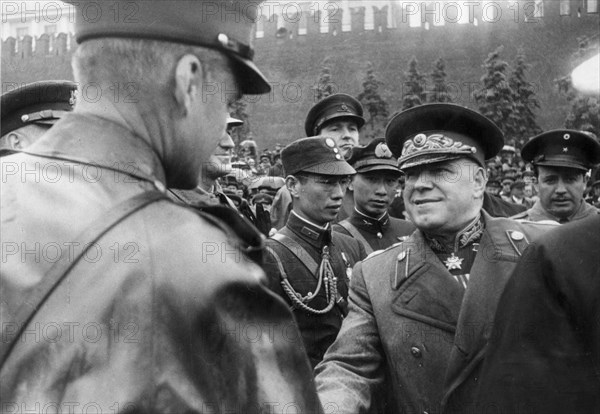 Marshal georgy zhukov greeting foreign military attaches during the time of the victory parade in moscow, may 1945.