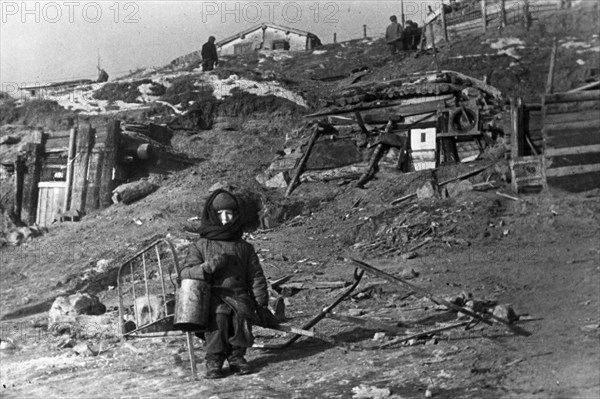 World war 2, battle of stalingrad, the few civilians still left in the city have dug themselves in on the shores of the volga river.