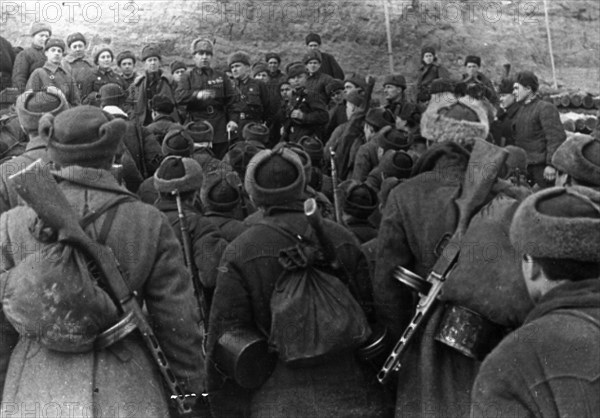 World war 2, battle of stalingrad, major general guriev, commander of the division, addresses the first reinforcements who arrived at stalingrad over the frozen volga river.