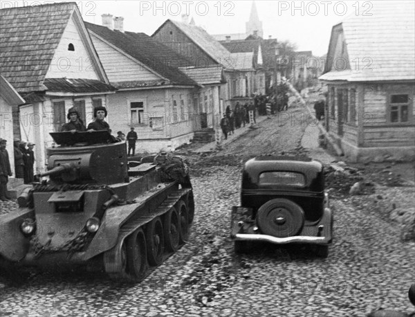 Red army tank drivers on a street in the city of rakov, poland, september 1939: soviet invasion of eastern poland, soviet troops were ordered to cross the frontier and 'take over the protection of life and property of the population of western ukraine and western belorussia,'.