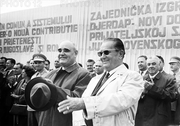 President tito and gheorghe gheorghiu dej acknowledging citizens' cheers at the mass meeting at kladovo marking the beginning of the works on the iron gates hydro-electric power plant, sep, 7, 1964.