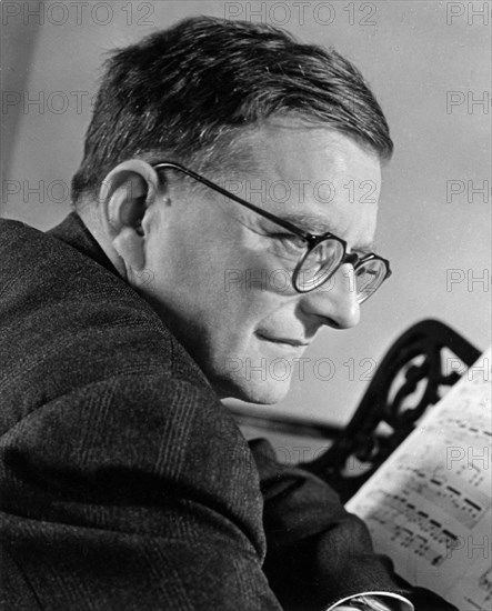 Soviet composer, dmitri shostakovich at his piano.