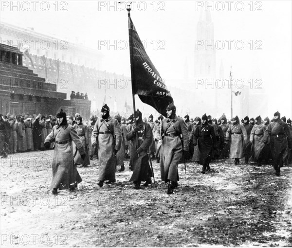 Red army march in red square past lenin's tomb in moscow, 1924.