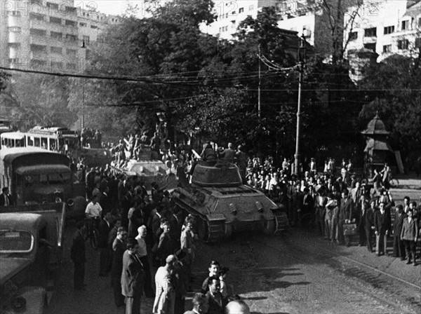 Soviet troops entering bucharest, the capital of rumania,  1944.