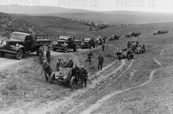 Soviet anti-tank guns taking up a firing position in the northern caucasus in september 1942, the trucks are american, sent as part of the lend-lease program.