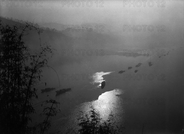 Boats on the chia-ling river, a tributary of the yangtze river in szechuan province, china, 1950s.