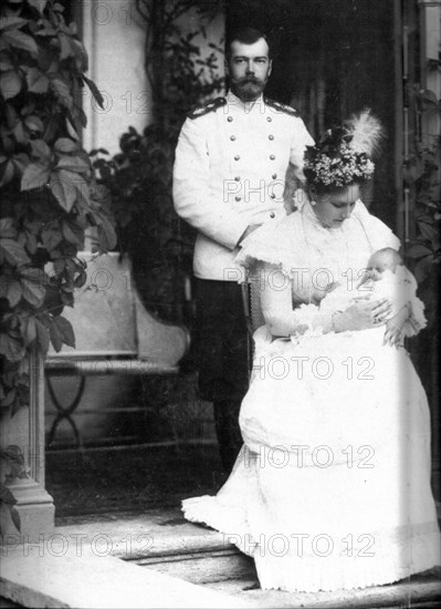 The royal couple of russia, tsar nicholas ll and tsarina alexandra fyodorovna with child.