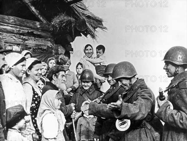 The population of a byelorussian village meeting the soviet red army liberators during world war 2.