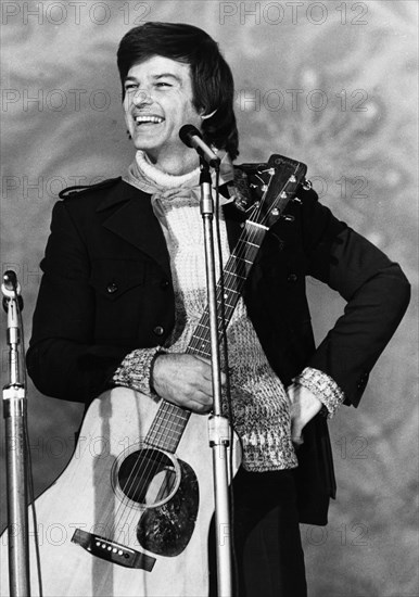 American singer, actor and director dean reed, on the invitation of the soviet peace committee, performing at the palace of pioneers in moscow, ussr on january 9, 1979.