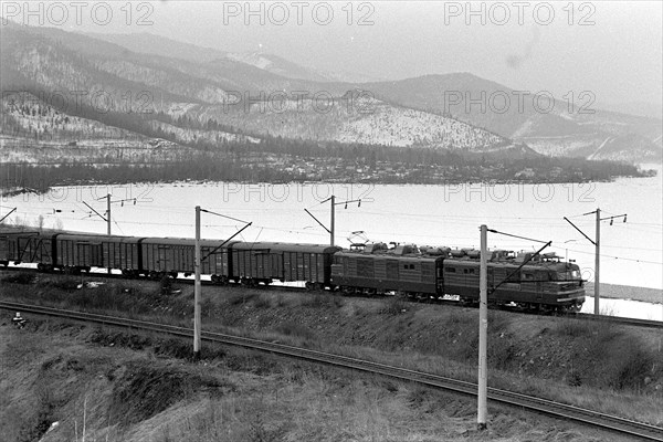 Irkutsk region, russia, a freight train makes its way on the trans-siberian railway in the irkutsk region, october 1997.