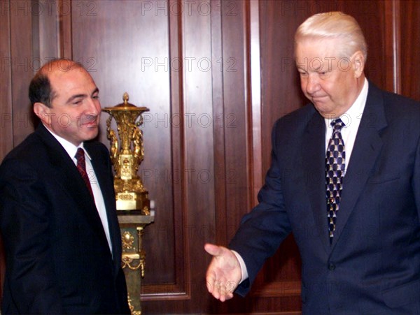 Moscow, russian federation, president boris yeltsin had a meeting with cis executive secretary boris berezovsky in the kremlin on thursday, berezovsky told yeltsin, who chairs the cis council of heads of state, about the course of work to implement the cis decisions, dated april 29, 1998, to refine cis activities and reform its bodies, boris yeltasin(r) and boris berezovsky are pictured prior to their talks, june 18, 1998.