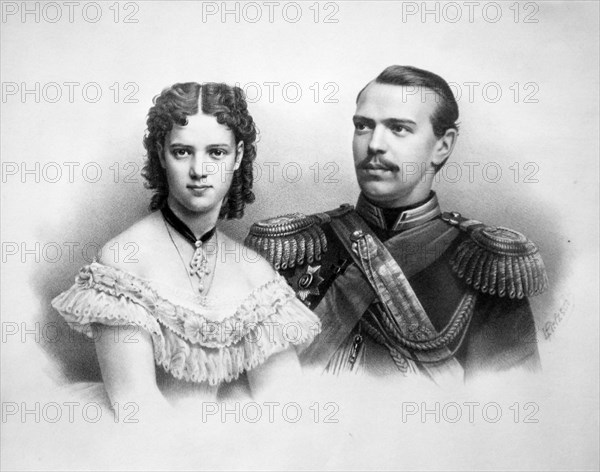 Portrait of grand duchess maria fyodorovna and heir to imperial russian throne, alexander alexandrovich by photographer sergei levitsky is on display at the exhibition 'emperor alexander lli and empress maria fyodorovna' in the manezh central exhibition hall.