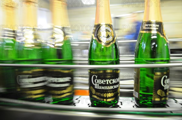 Moscow, russia, november 29, 2010, sovetskoye shampanskoye bottling line at kornet, a moscow-based champagne winery.