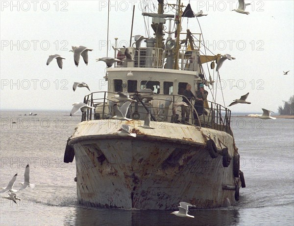 Leningrad region, russia, one of the ships returning home with a goog catch (in pic), the collective enterprise 'baltika' is the only business in the region with the full production cycle from fishing to packing ready produce, the facility gives 3,000 tonnes of fresh and 13mln cans of processed sprats, april 29, 2002.