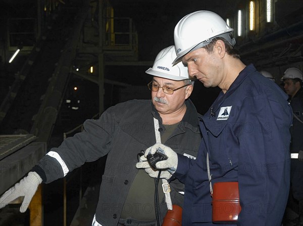 Norilsk, russia, march 21, norilsk nickeli´s future ceo denis morozov, right, tours the oktyabrsky mine of the norilsk nickel.