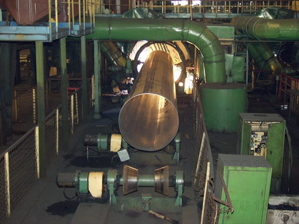 Finishing of a pipe product at the khartsizsk pipe plant, the main buyer of such pipes in russia is the gazprom company, donetsk region, ukraine, august 14 2003.