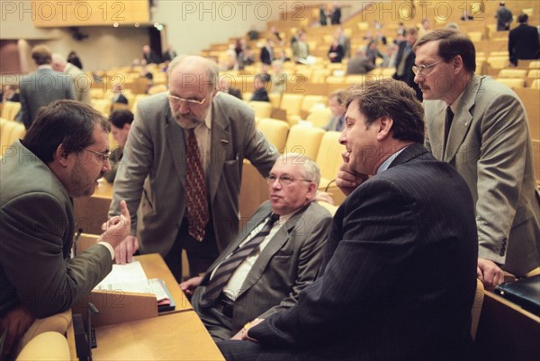 Boris nadezhdin, deputy head of the union of right forces faction and members of the yabloko faction sergei popov, vladimir lukin,sergei ivanenko and alexey arbatov (all l-r) talk during the plenary session of the state duma (lower house of the russsian parliament) on tuesday september 16.