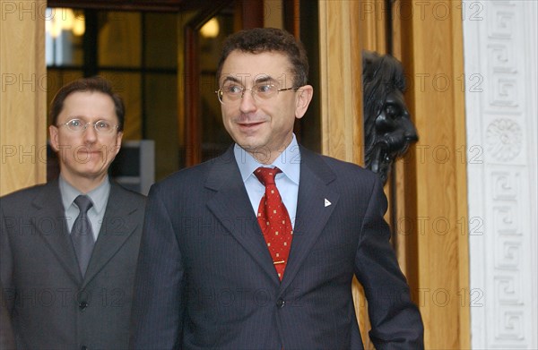 Moscow, russia, november 28, 2003, yukos board chairman semyon kukes (foreground) prior to the extraordinary meeting of yukos shareholders that took place in the russian chamber of trade and industry today.