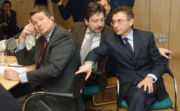 Moscow,russia, december 17, 2003, executive director of the 'yukos-moskva' company steven theede , vice-president of the 'yukos-moskva' alexander temerko and semyon kukes,chairman of the directors' board of the 'yukos' oil company are seen at the press-conference ,on wednesday.