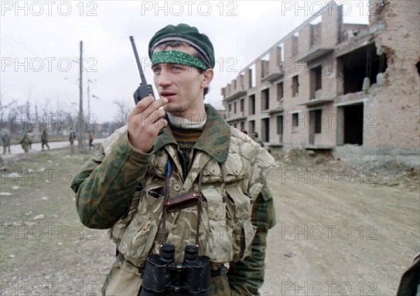 Small groups of chechen rebels are putting up resistance to police and federal troops in the outskirts of grozny, the situation in the centre of grozny is returning to normal,ops: a dudaev militant in zavodskoy district of the city, march 11, 1996.